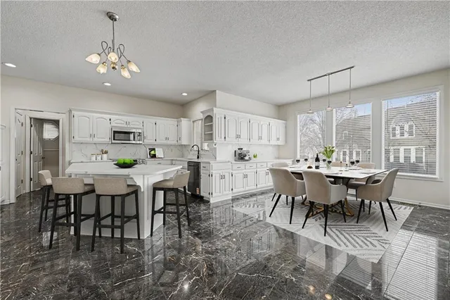 $575,000 | 19618 West 99th Street, Lenexa, KS 66220