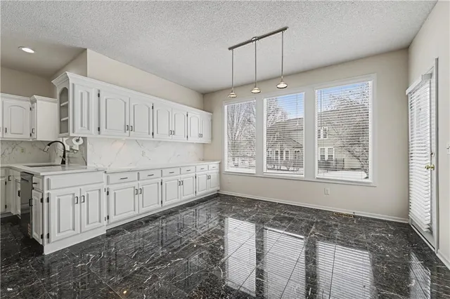 $575,000 | 19618 West 99th Street, Lenexa, KS 66220