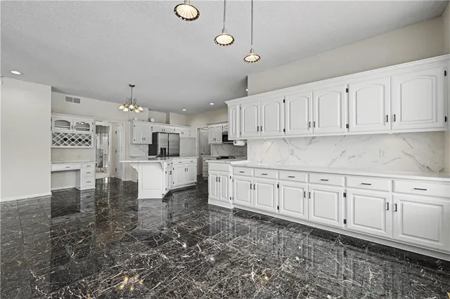 $575,000 | 19618 West 99th Street, Lenexa, KS 66220