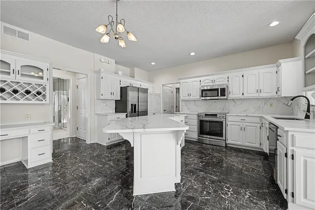 $575,000 | 19618 West 99th Street, Lenexa, KS 66220