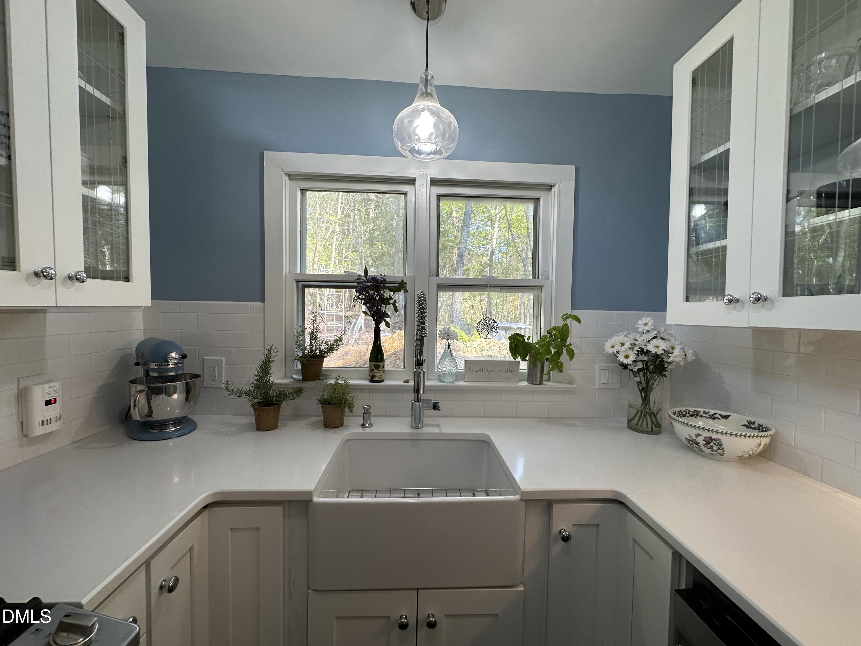 6202 Montgomery Ests Road Hillsborough, NC 27278 - Photo 16 of 91 a kitchen with a sink cabinets and window