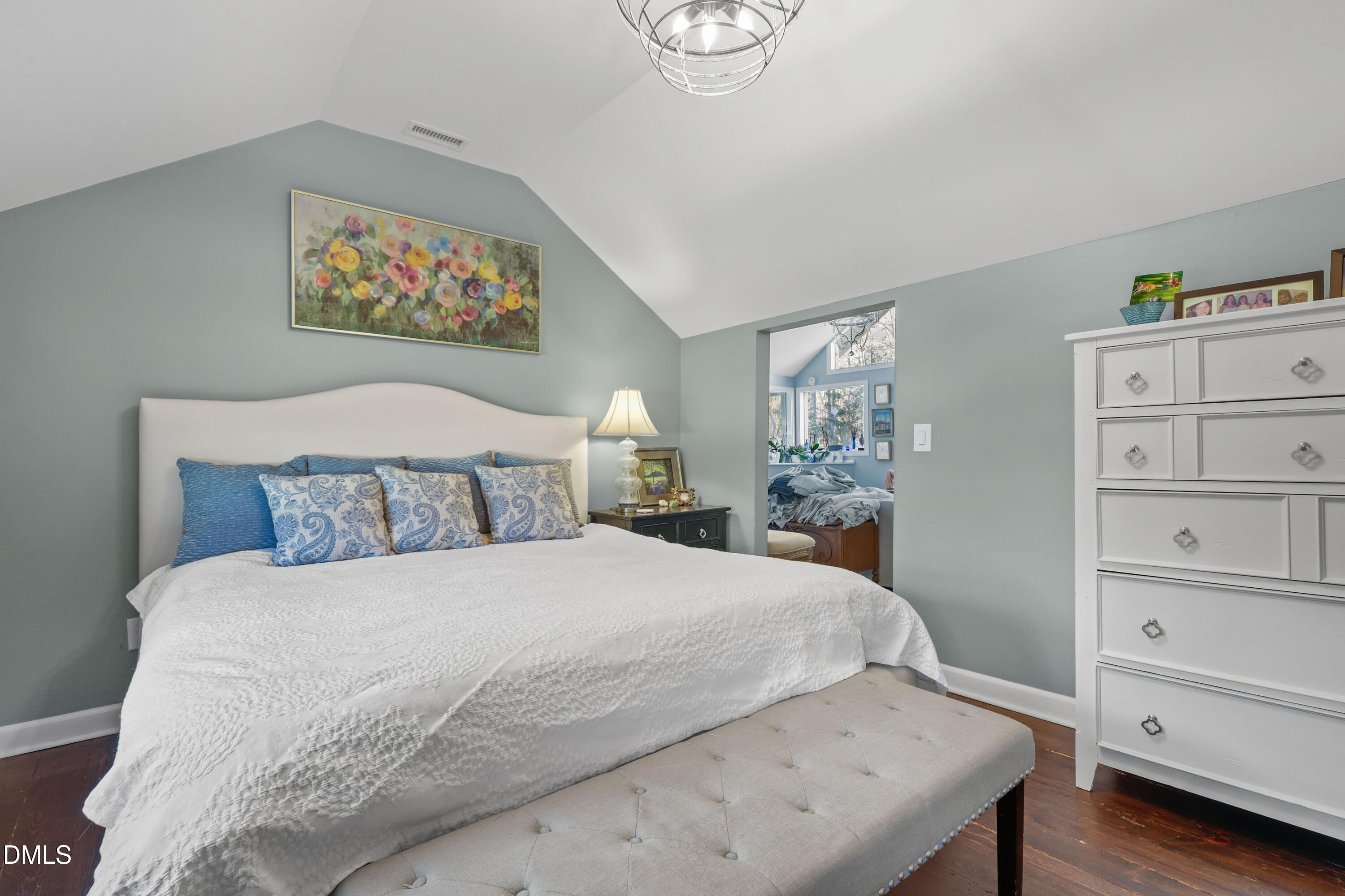 6202 Montgomery Ests Road Hillsborough, NC 27278 - Photo 20 of 91 a bedroom with a large bed and a dresser