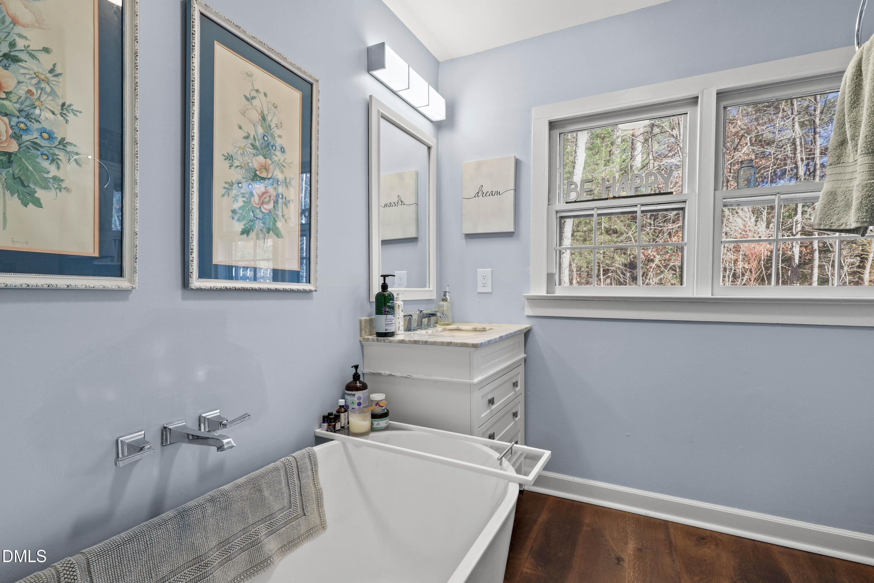 6202 Montgomery Ests Road Hillsborough, NC 27278 - Photo 22 of 91 a bathroom with a sink and a bathtub