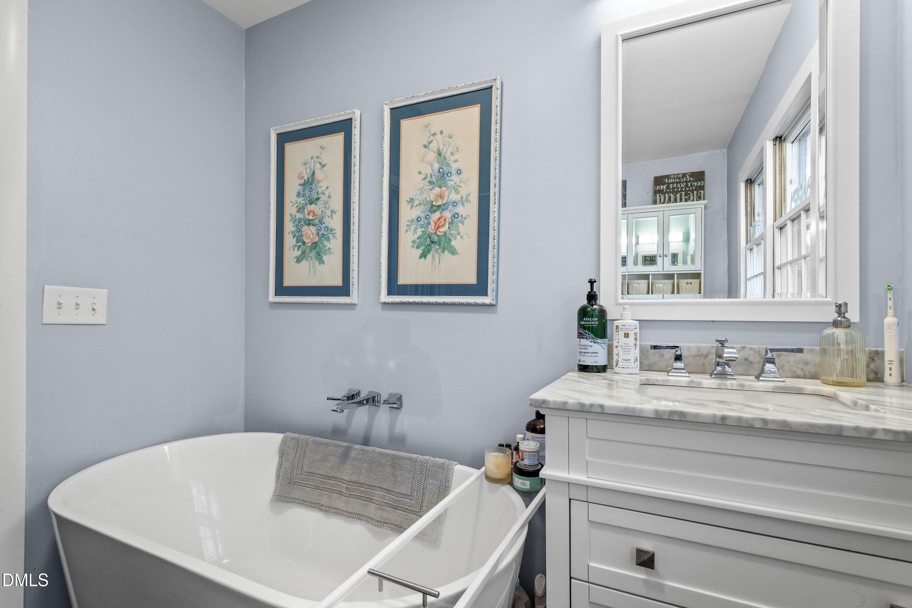 6202 Montgomery Ests Road Hillsborough, NC 27278 - Photo 23 of 91 a bathroom with a sink and a bathtub