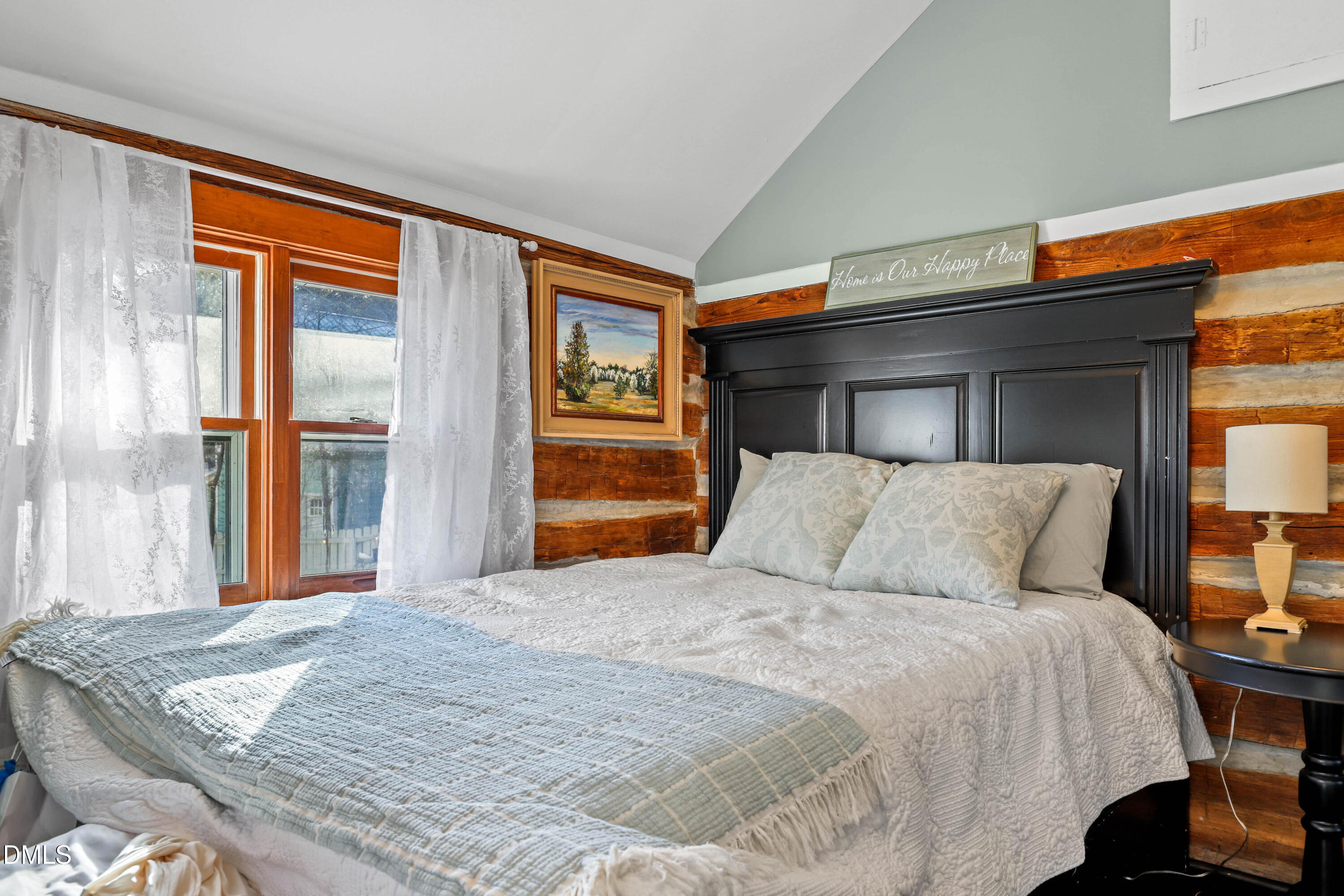 6202 Montgomery Ests Road Hillsborough, NC 27278 - Photo 25 of 91 a bedroom with a bed and lamp next to a window