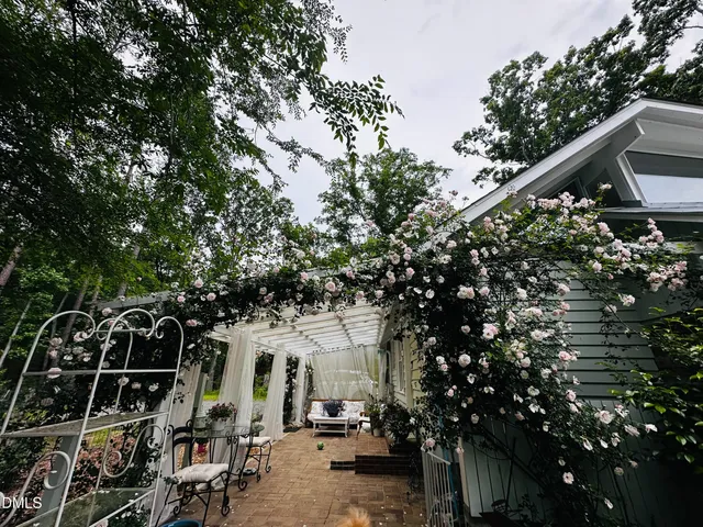 a view of a pathway with a yard