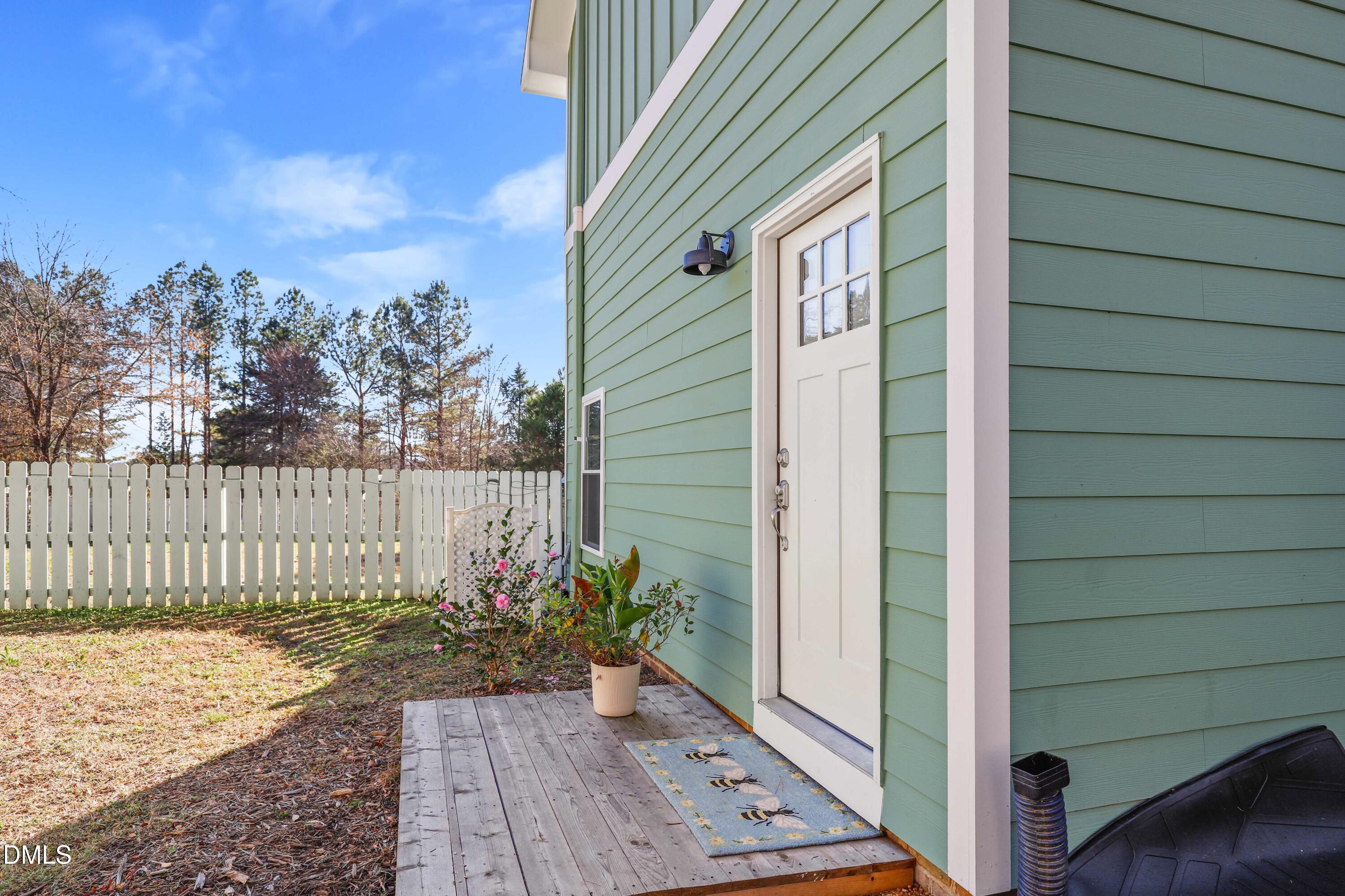 6202 Montgomery Ests Road Hillsborough, NC 27278 - Photo 59 of 91 a view of a house with a backyard