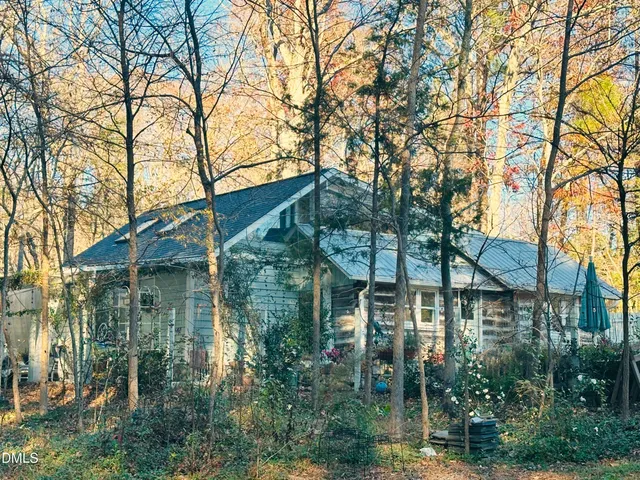 a bed room with furniture and a window
