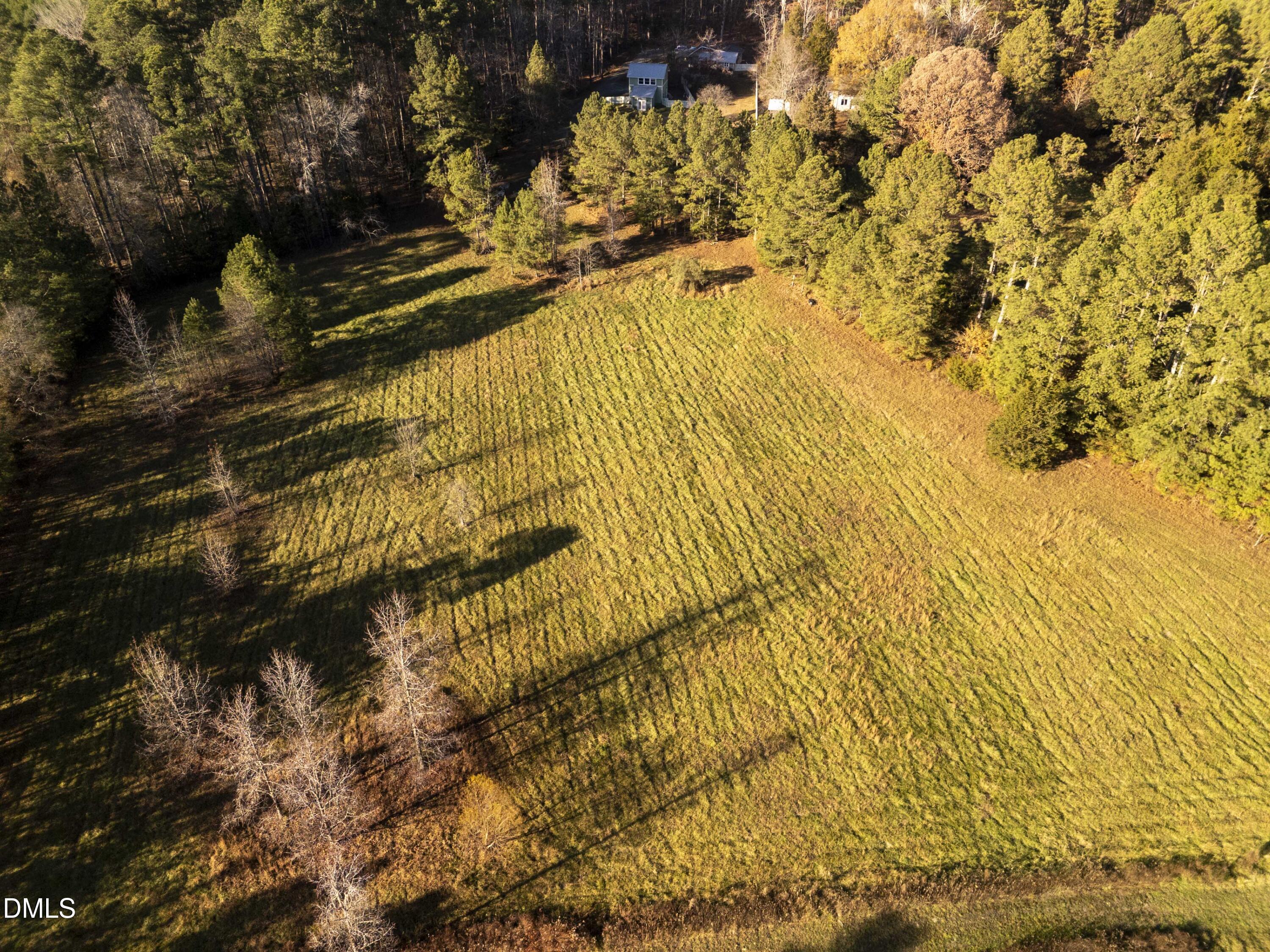 6202 Montgomery Ests Road Hillsborough, NC 27278 - Photo 85 of 91 a view of swimming pool from a lake view