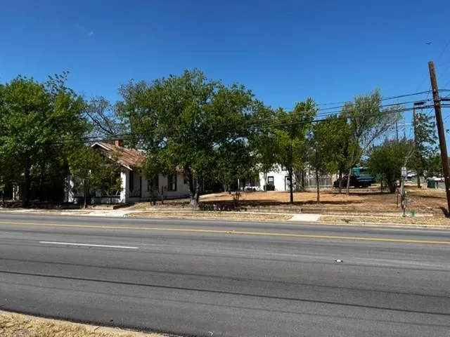 a front view of a house with street