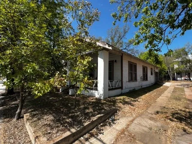 a balcony with wooden floor