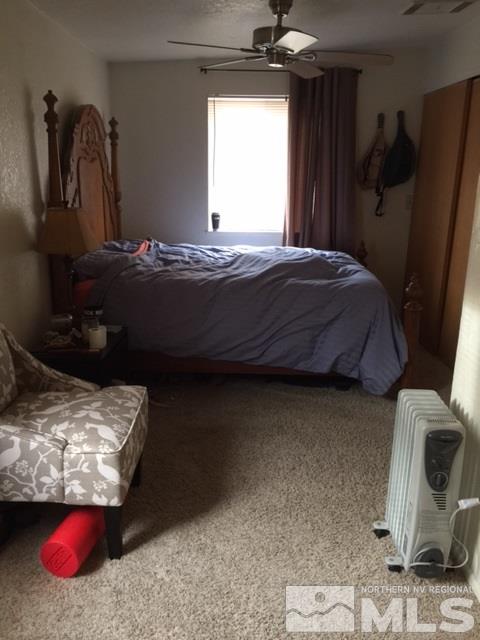 729 Plumas Street Reno, NV 89509 - Photo 10 of 21 a bedroom with a bed and dresser