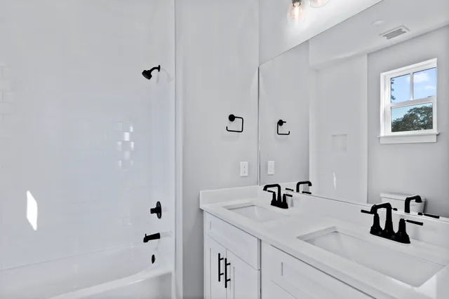 a bathroom with a sink and a tub