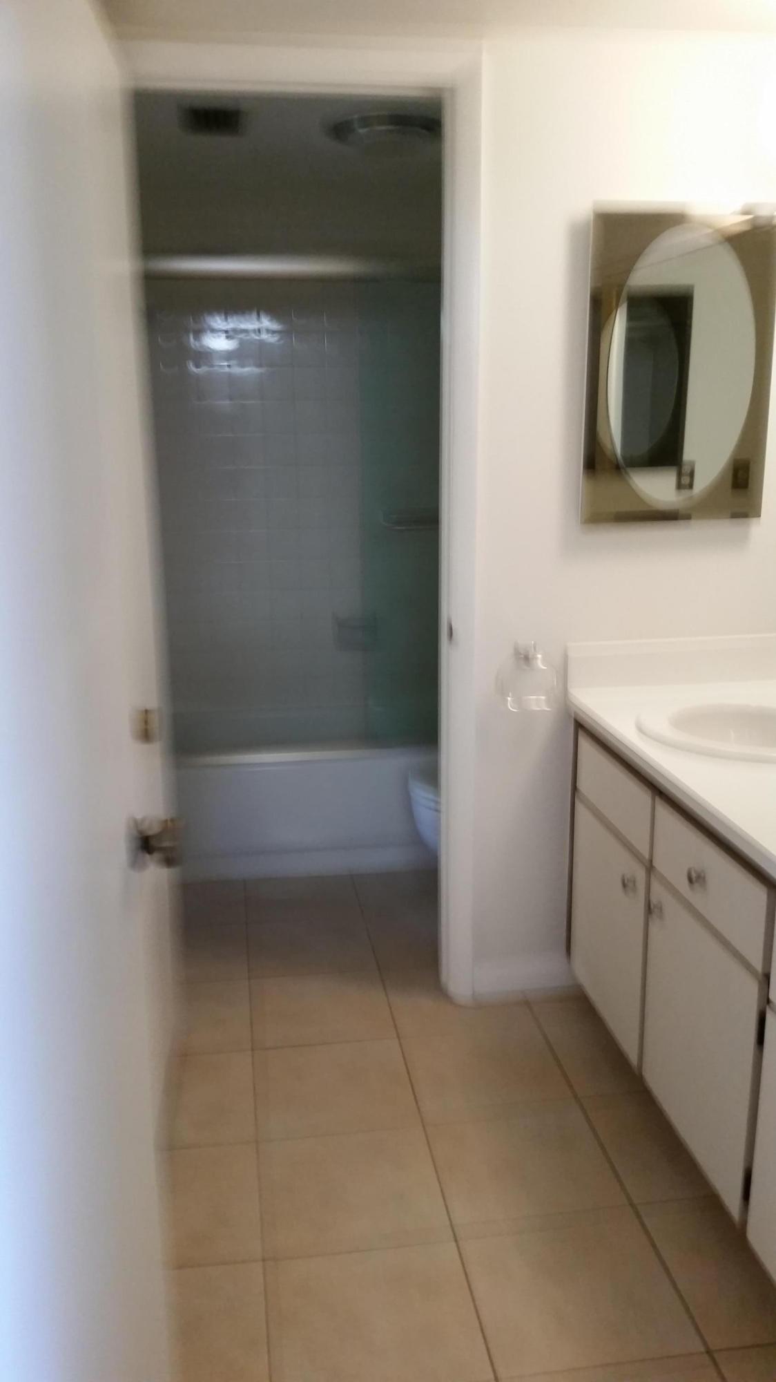 800 Northwest Fork Road, Unit 71 Stuart, FL 34994 - Photo 6 of 23 a bathroom with a bathtub
