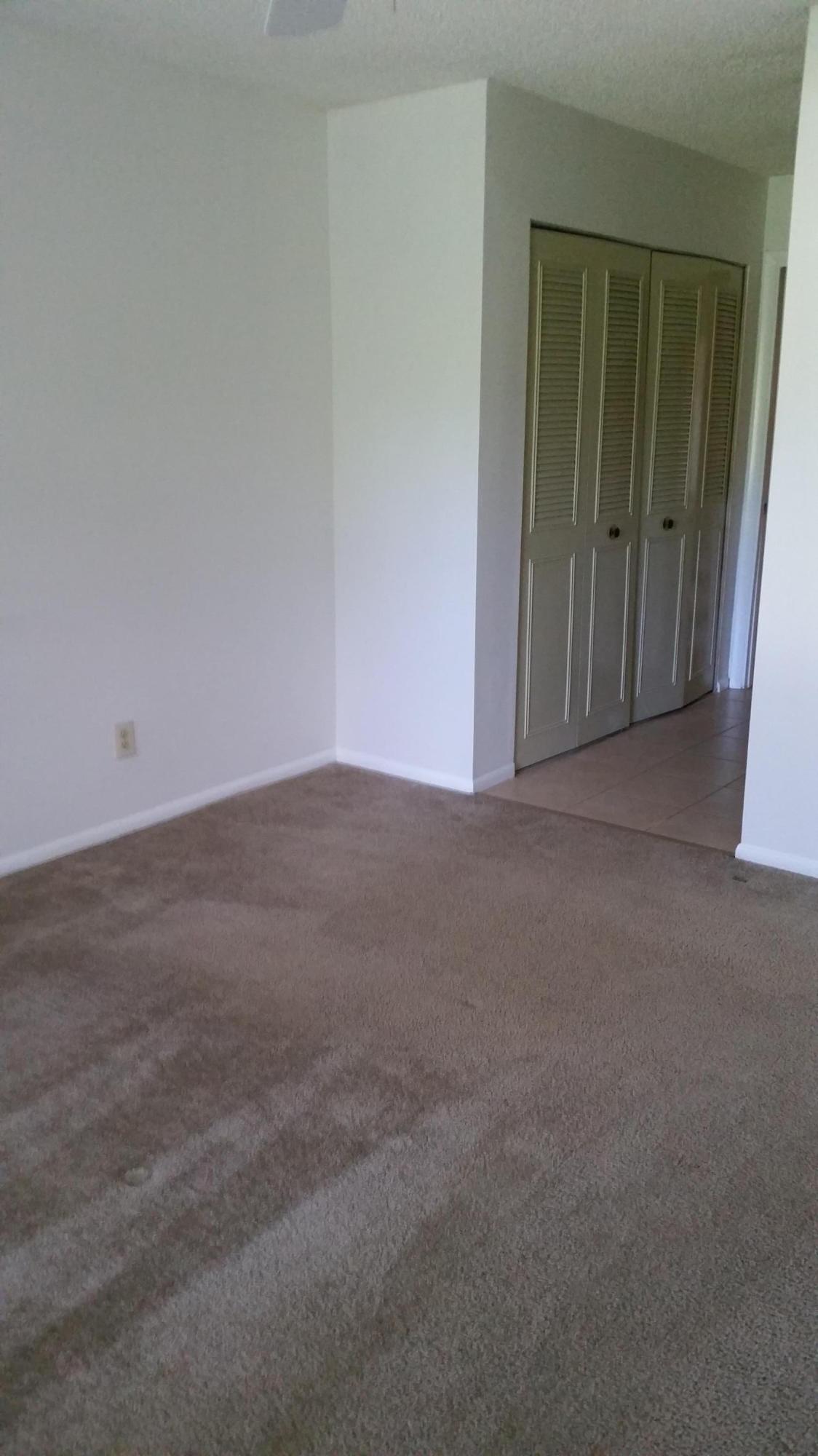 800 Northwest Fork Road, Unit 71 Stuart, FL 34994 - Photo 7 of 23 an empty room with closet area