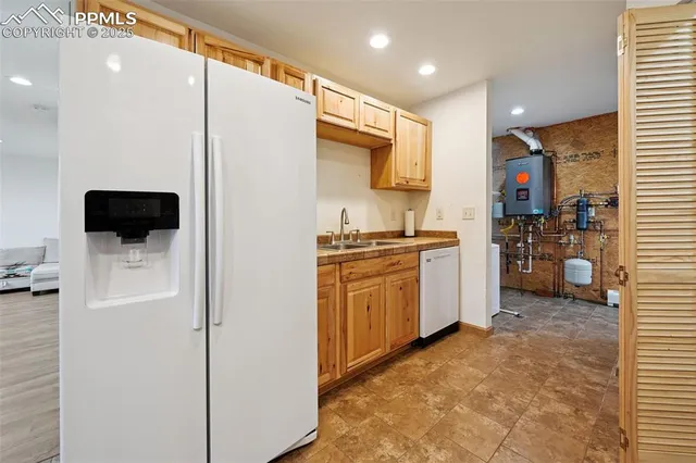 a kitchen with a stove and a microwave