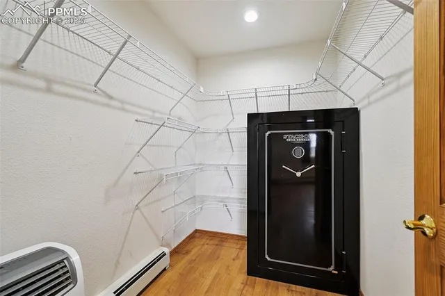 a kitchen with stainless steel appliances a refrigerator and a stove