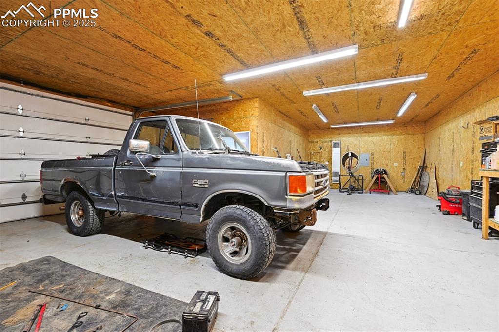 1220 Choate Lane Yoder, CO 80864 - Photo 27 of 47 a view of a car in garage