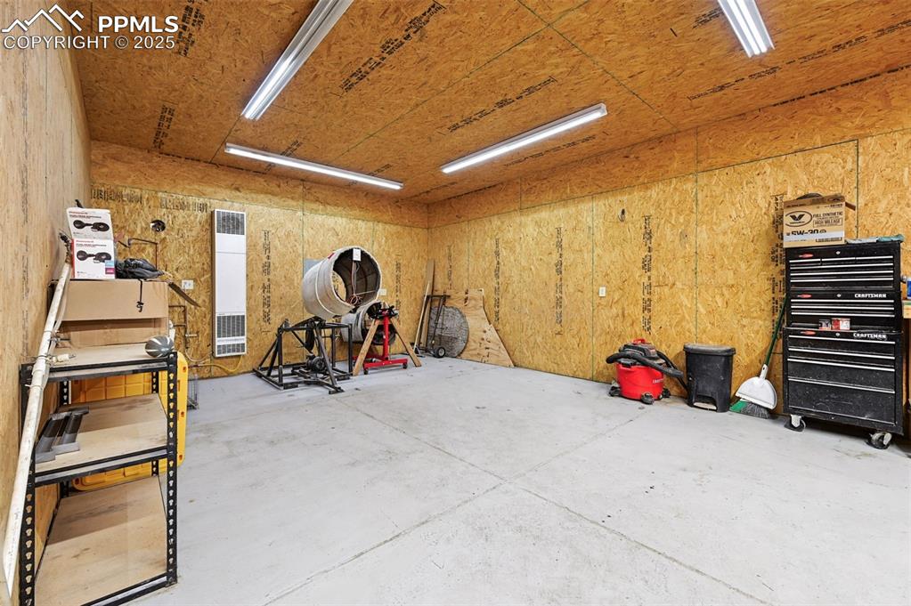 1220 Choate Lane Yoder, CO 80864 - Photo 29 of 47 a view of a room with gym equipment