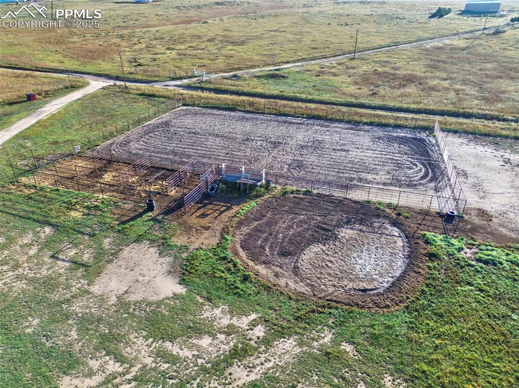 1220 Choate Lane Yoder, CO 80864 - Photo 33 of 47 a view of a backyard with wooden floor