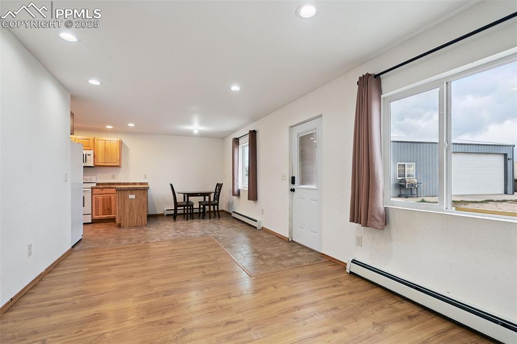 1220 Choate Lane Yoder, CO 80864 - Photo 10 of 47 a living room with furniture and a table