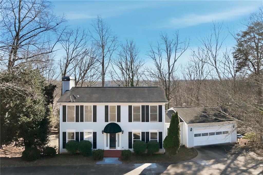 a view of a building with a yard