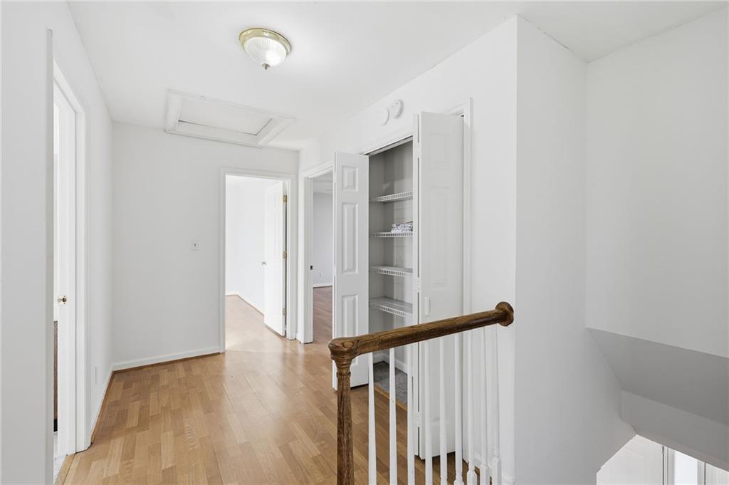 2453 Basin Court Gainesville, GA 30506 - Photo 29 of 47 a view of a hallway with wooden floor