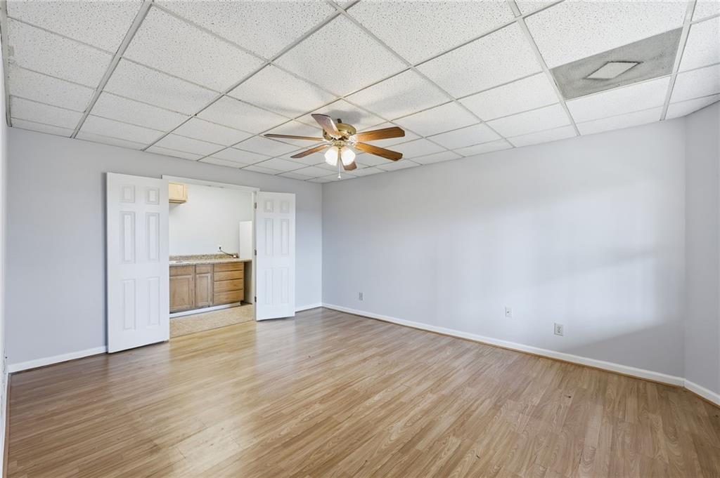 2453 Basin Court Gainesville, GA 30506 - Photo 36 of 47 a view of empty room with wooden floor