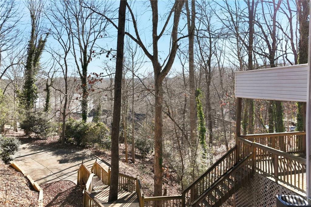 2453 Basin Court Gainesville, GA 30506 - Photo 45 of 47 a view of a balcony with trees
