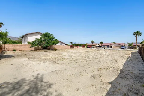 a view of a backyard of a house