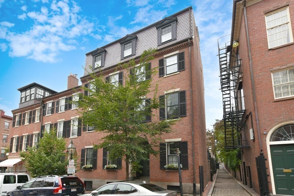59 Chestnut Street Boston, MA 02108 - Photo 33 of 33 a front view of a building with lot of cars and trees