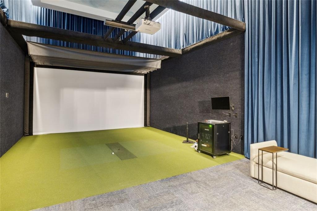 2425 Peachtree Street Northeast, Unit 1106 Atlanta, GA 30305 - Photo 16 of 43 a view of a swimming pool with a lounge chairs