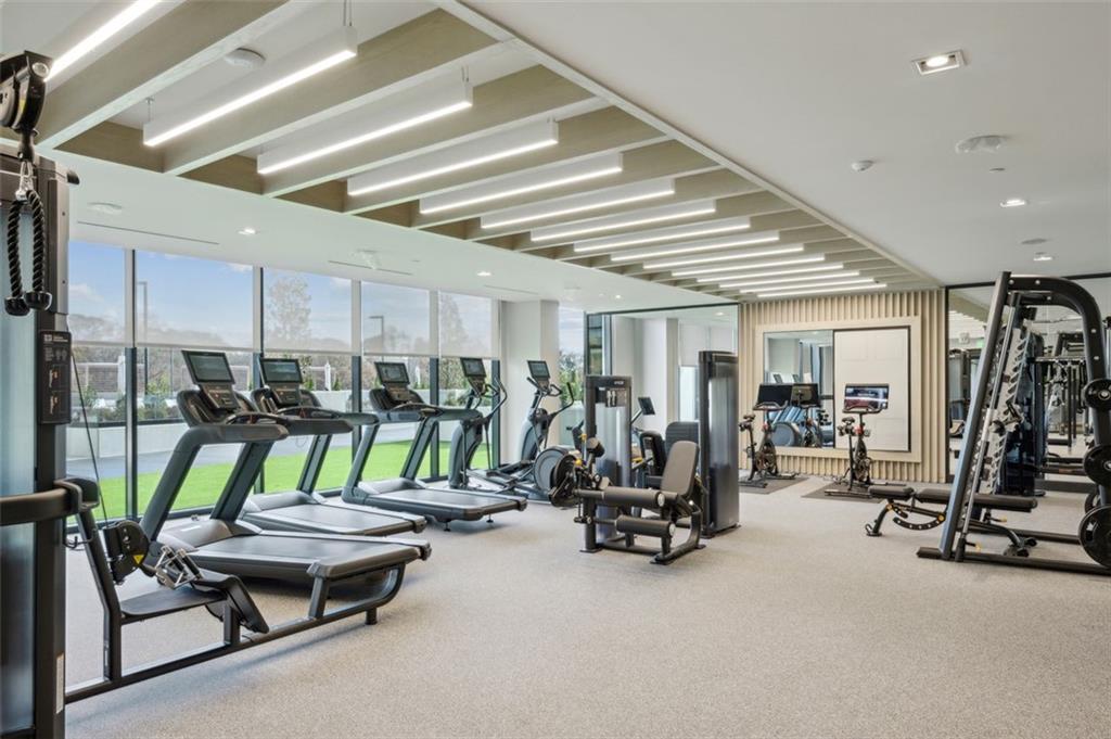 2425 Peachtree Street Northeast, Unit 1106 Atlanta, GA 30305 - Photo 18 of 43 a view of a room with gym equipment