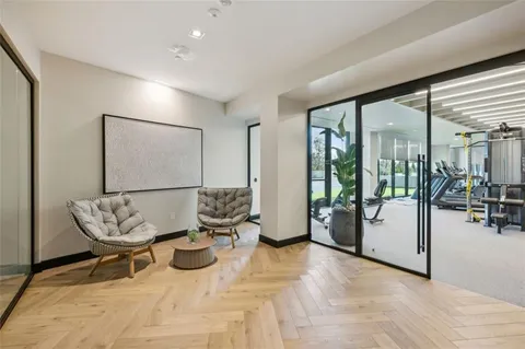 a kitchen with a sink and chandelier