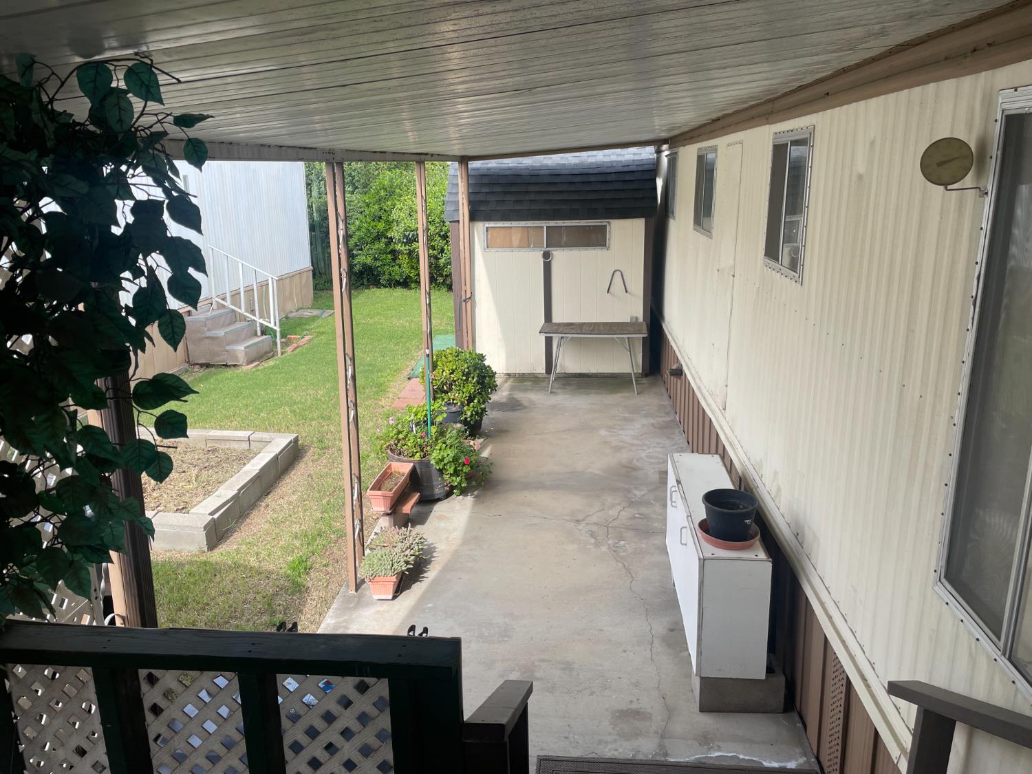 5835 Cherokee Road, Unit 52 Stockton, CA 95215 - Photo 5 of 19 a view of a porch with furniture