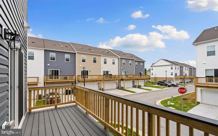 8710 Cherrybark Road Clinton, MD 20735 - Photo 16 of 19 a view of a balcony with wooden floor