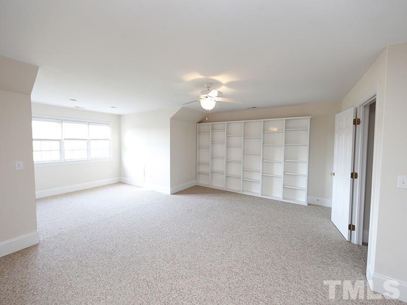2301 Elmsford Way Raleigh, NC 27608 - Photo 5 of 25 a view of an empty room with a window