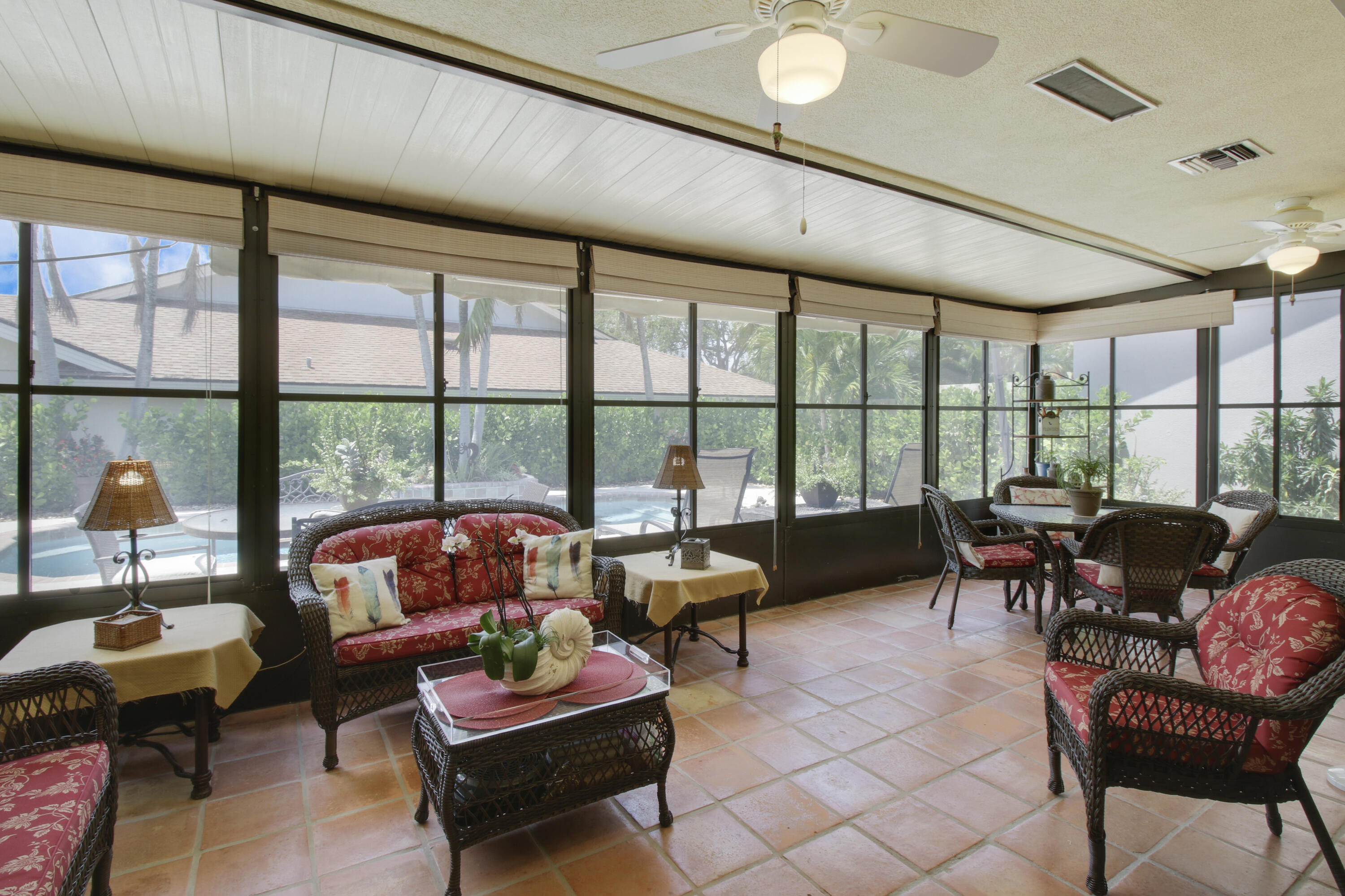 104 Harbourside Circle Jupiter, FL 33477 - Photo 31 of 41 a living room with furniture and a large window