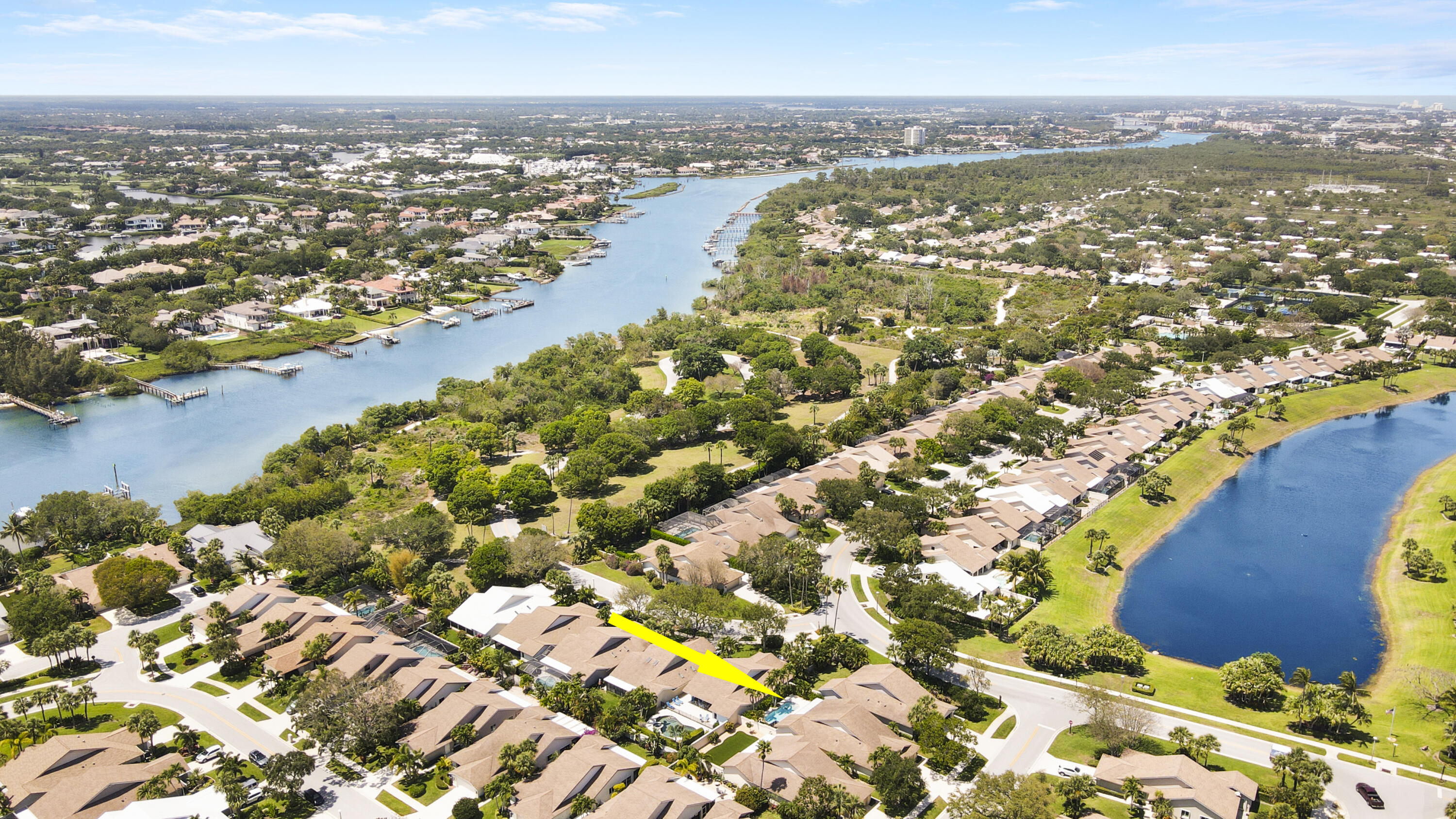 104 Harbourside Circle Jupiter, FL 33477 - Photo 38 of 41 an aerial view of residential building and lake view