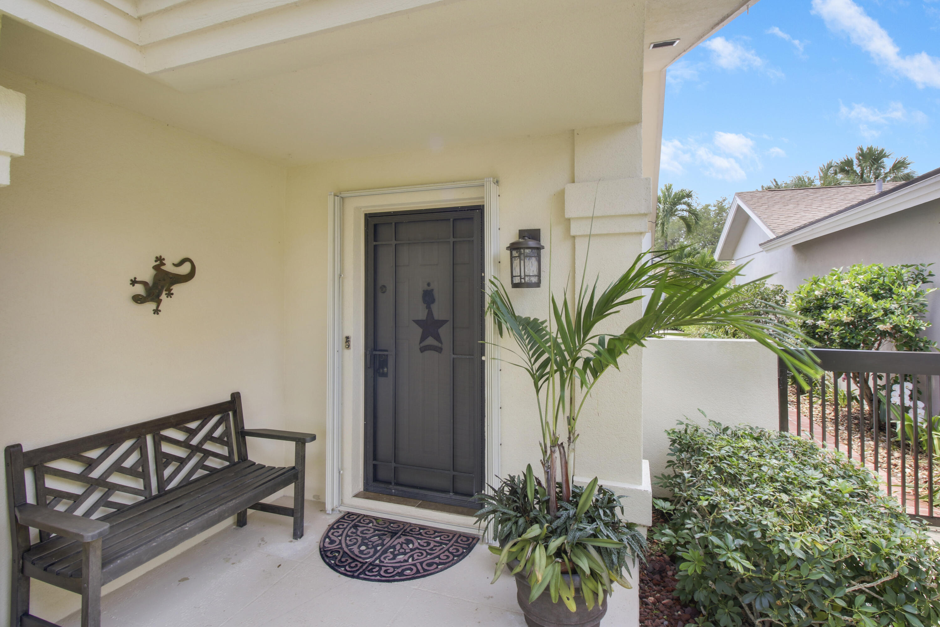 104 Harbourside Circle Jupiter, FL 33477 - Photo 5 of 41 a view of entryway with a potted plant