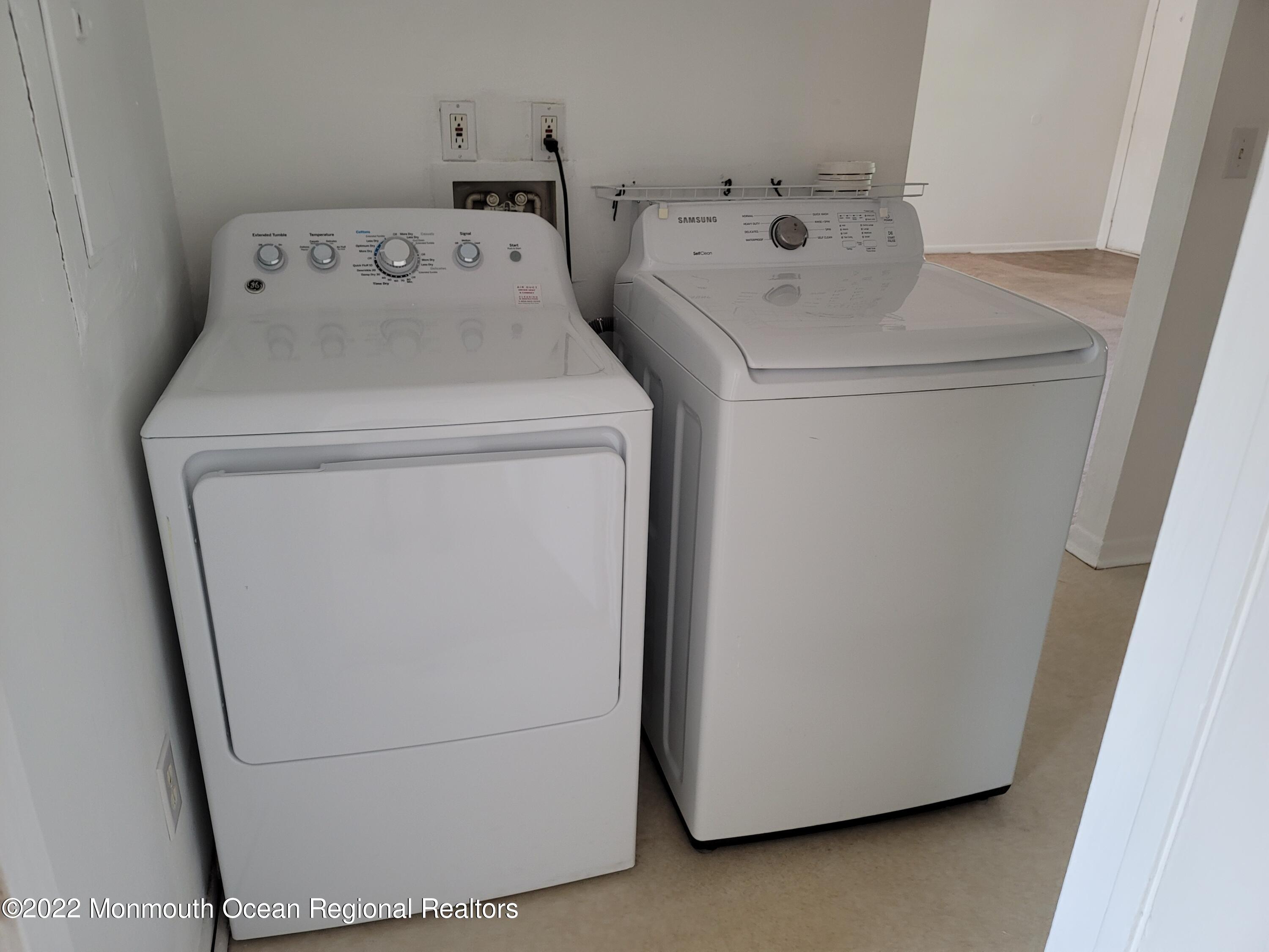 55 White Street, Unit C Eatontown, NJ 07724 - Photo 17 of 21 a utility room with dryer and washer