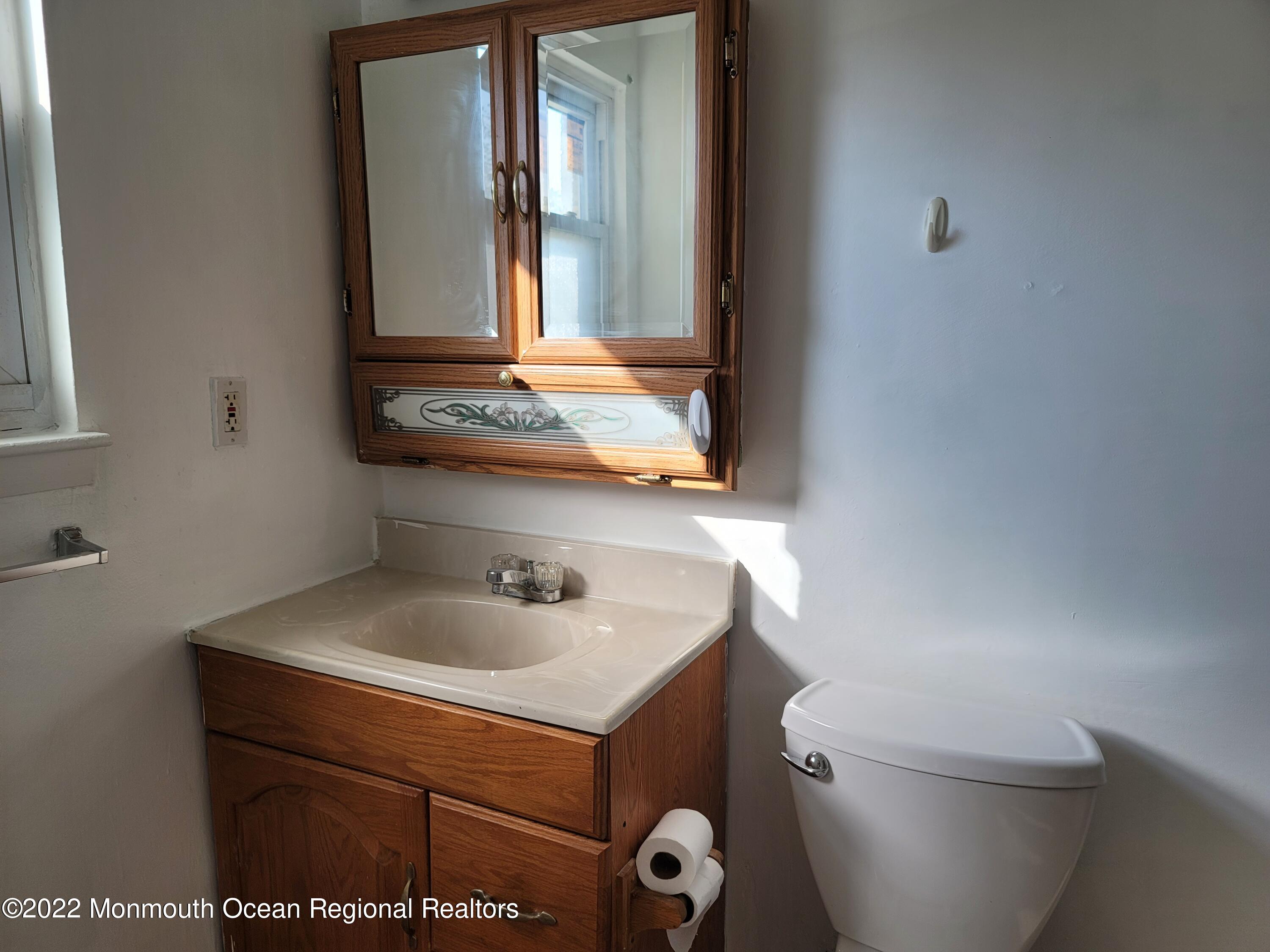55 White Street, Unit C Eatontown, NJ 07724 - Photo 21 of 21 a bathroom with a sink and a toilet