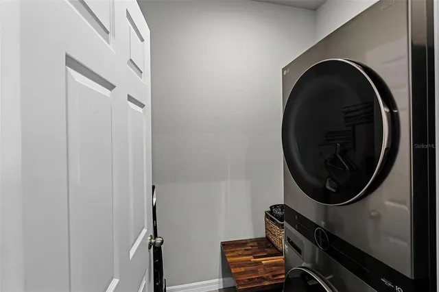 a view of a room with washer and dryer
