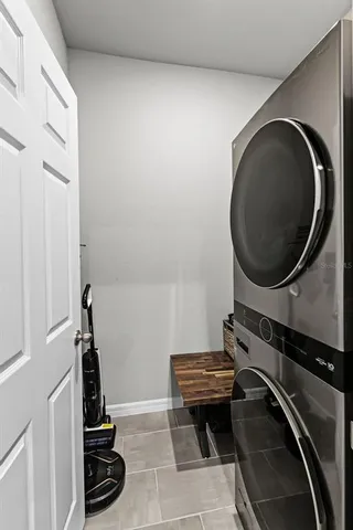 a view of storage and utility room with washer and dryer