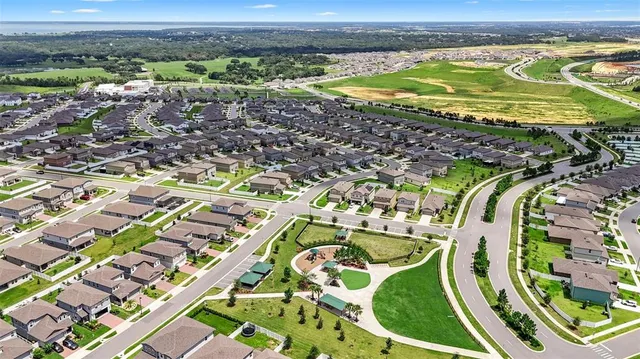 a view of a swimming pool with a lot of trees