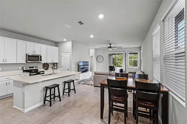 a view of a dining room with furniture