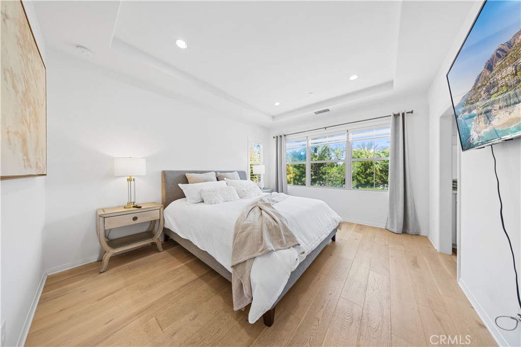55 Rembrandt Irvine, CA 92620 - Photo 18 of 29 a bedroom with a bed and a large window