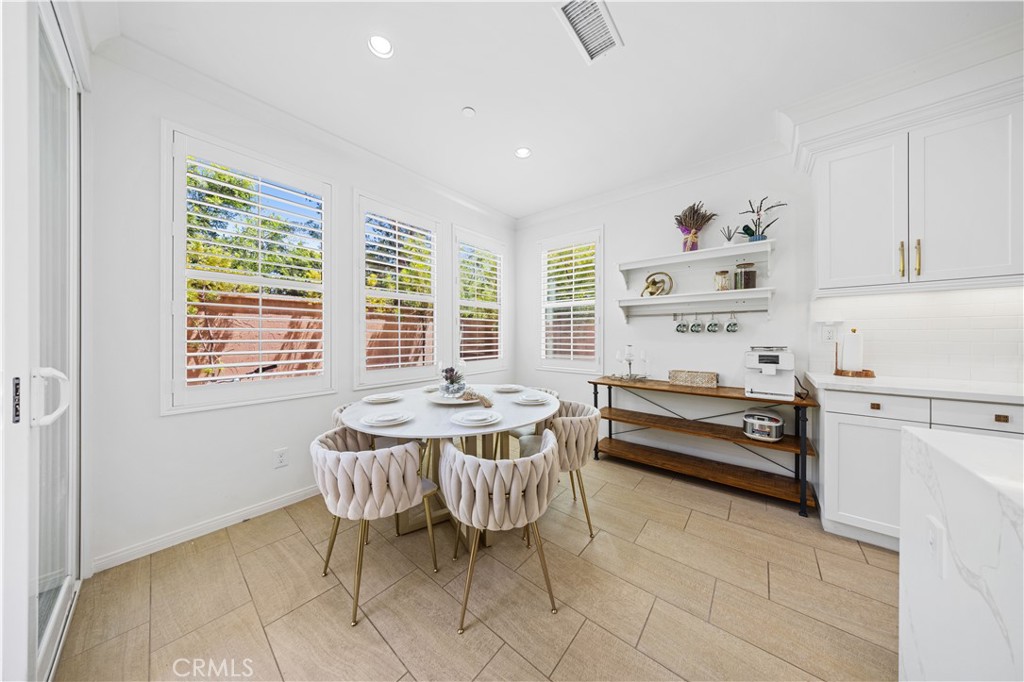 55 Rembrandt Irvine, CA 92620 - Photo 10 of 29 a dining room with furniture and window