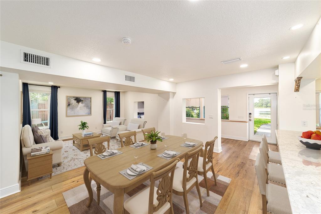 10399 Northeast 218th Lane Road Fort McCoy, FL 32134 - Photo 27 of 68 a view of a dining room with furniture window and wooden floor