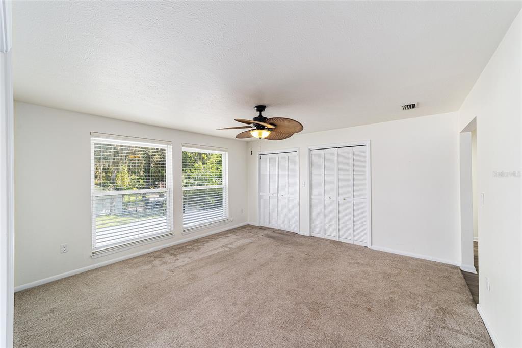 10399 Northeast 218th Lane Road Fort McCoy, FL 32134 - Photo 39 of 68 a view of an empty room with a window